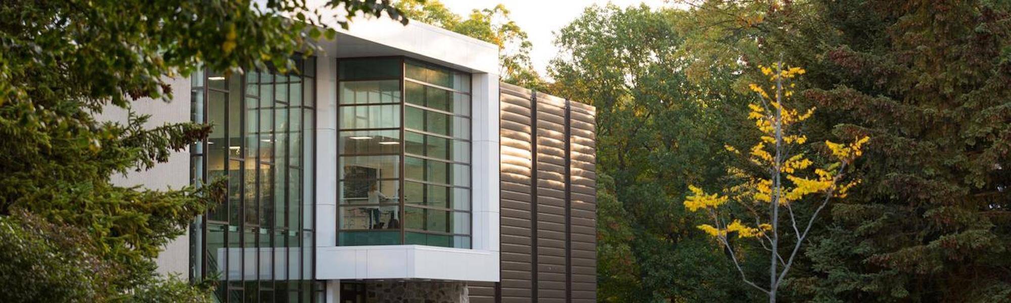 Windows of Au Sable Hall at sunrise